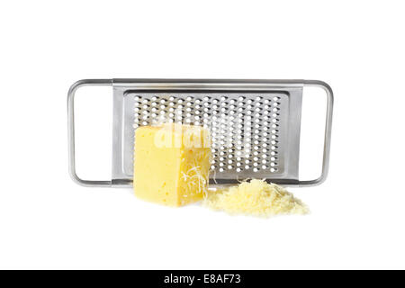 Cheese grated and piece in front of grater isolated on white background with shadow Stock Photo