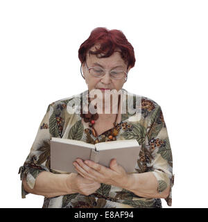 Senior woman with glasses reads book isolated on white background Stock Photo
