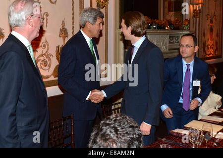 U.S. Secretary of State John Kerry greets Austrian Foreign Minister Sebastian Kurz before the start of the Transatlantic Dinner Stock Photo