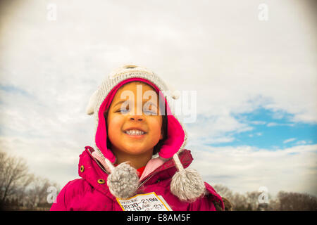 Portrait of girl in knit hat with eyes closed Stock Photo