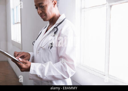 Female doctor using digital tablet Stock Photo