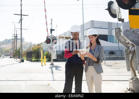Female architects with digital tablet Stock Photo