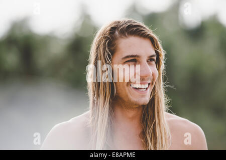 Man in long hair with wide smile Stock Photo