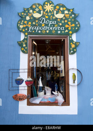 Elaborate window display of an artisans shop in the village of Fiskardo on the Island of Kefalonia in Greece Stock Photo