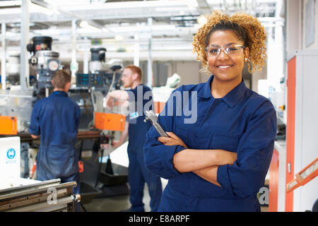 Portrait of female student in workshop at college Stock Photo