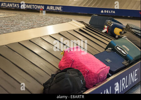 Baggage claim carousel with luggage at Atlanta International Airport in Atlanta, Georgia, USA. Stock Photo