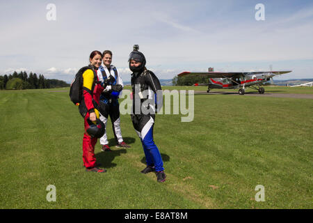 Portrait of skydiving team preparing to fly, Buttwil, Luzern, Switzerland Stock Photo