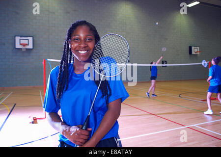 Young woman on badminton court, portrait Stock Photo