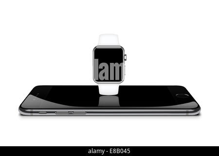 Apple watch white reflected on iphone 6 space gray, digitally generated image. Stock Photo
