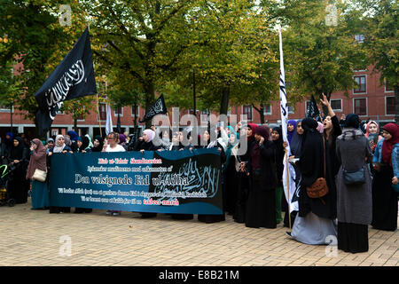 Copenhagen, Denmark. 3rd October, 2014. Muslims gather in Copenhagen to celebrate the Eid feast organized by Hizb ut-Tharir.  This Eid event, - called Eid ul-Adha - is the second this year and is held 70 days after the end of Ramadan and coincides with the pilgrimage to Mecca. Hizb ut-Tharir see establishment of the caliphate, ruled by Islamic law, as its goal. Credit:  OJPHOTOS/Alamy Live News Stock Photo