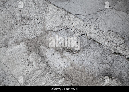 Old gray grungy asphalt road background texture Stock Photo