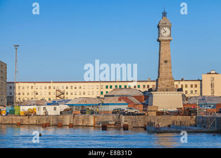 Old port of Barcelona, Spain. Torre del Rellotge one of the city most iconic buildings, was built in 1772 in Port Vell Stock Photo