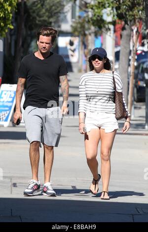 Sean Stewart and his new girlfriend strolling along Sunset Boulevard  Featuring: Sean Stewart Where: Los Angeles, California, United States When: 01 Apr 2014 Stock Photo