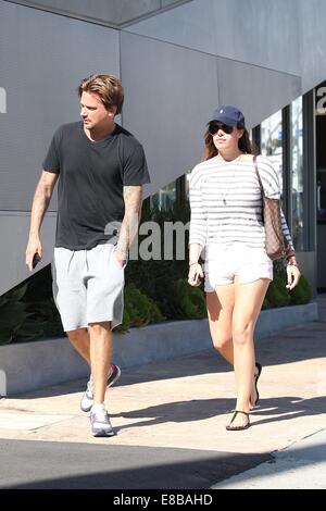 Sean Stewart and his new girlfriend strolling along Sunset Boulevard  Featuring: Sean Stewart Where: Los Angeles, California, United States When: 01 Apr 2014 Stock Photo