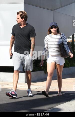 Sean Stewart and his new girlfriend strolling along Sunset Boulevard  Featuring: Sean Stewart Where: Los Angeles, California, United States When: 01 Apr 2014 Stock Photo