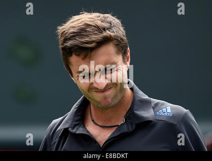 Tokyo, Japan. 4th Oct, 2014. Gilles Simon of France reacts during the men's singles semifinal match against Milos Raonic of Canada at the Rakuten Japan Open Tennis Championships 2014 in Tokyo, Japan, Oct. 4, 2014. Credit:  Stringer/Xinhua/Alamy Live News Stock Photo