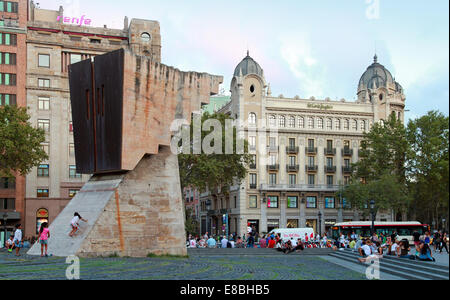 BARCELONA, SPAIN - AUGUST 25, 2014: View of Placa de Catalunya with walking people and Francesc Macia monument Stock Photo