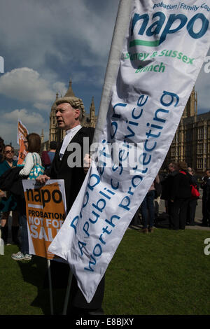 Lawyers and Probation Officers demonstrate outside Parliament against the Ministry of Justice's new 'Fee and Contract' arrangements. Meaning, people accused of a crime who can't afford a lawyer will not get justice.  Featuring: Barrister protesting Where: London, United Kingdom When: 01 Apr 2014 Stock Photo