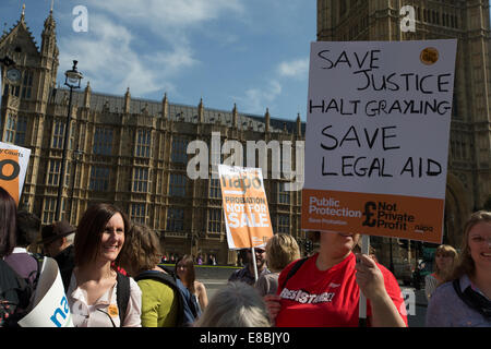 Lawyers and Probation Officers demonstrate outside Parliament against the Ministry of Justice's new 'Fee and Contract' arrangements. Meaning, people accused of a crime who can't afford a lawyer will not get justice.  Featuring: Atmosphere Where: London, United Kingdom When: 01 Apr 2014 Stock Photo