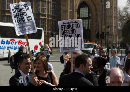 Lawyers and Probation Officers demonstrate outside Parliament against the Ministry of Justice's new 'Fee and Contract' arrangements. Meaning, people accused of a crime who can't afford a lawyer will not get justice.  Featuring: Atmosphere Where: London, United Kingdom When: 01 Apr 2014 Stock Photo