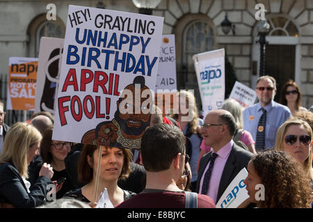 Lawyers and Probation Officers demonstrate outside Parliament against the Ministry of Justice's new 'Fee and Contract' arrangements. Meaning, people accused of a crime who can't afford a lawyer will not get justice.  Featuring: Atmosphere Where: London, United Kingdom When: 01 Apr 2014 Stock Photo