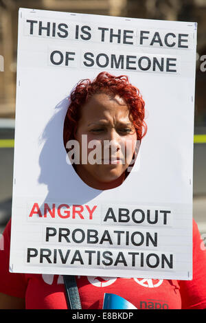 Lawyers and Probation Officers demonstrate outside Parliament against the Ministry of Justice's new 'Fee and Contract' arrangements. Meaning, people accused of a crime who can't afford a lawyer will not get justice.  Featuring: View Where: London, United Kingdom When: 01 Apr 2014 Stock Photo