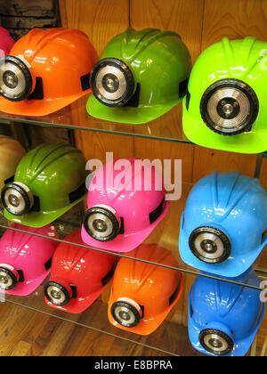 Colorful Plastic Helmets with Miners Lights, Wall Drug Store, Wall, South Dakota, USA Stock Photo
