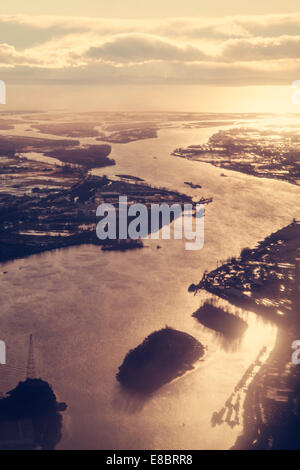 Aerial view of the Fraser River, Vancouver British Columbia at sunset, river valley in the glow of the sunset Stock Photo