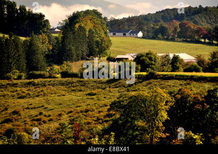 Williamstown, MA: Rolling farmlands with clouds nestling on the Berkshire Hills Stock Photo