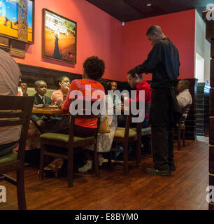 family dining, Outback Steakhouse restaurant, Nassau, Bahamas Stock Photo