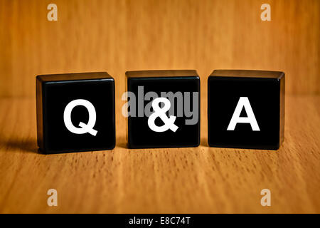 Q&A or Questions and answers text on black block Stock Photo