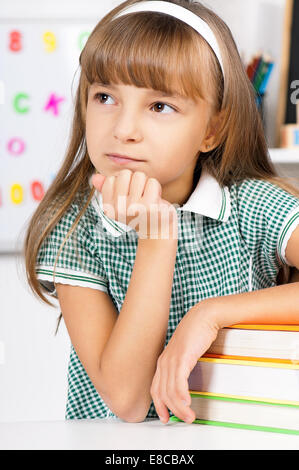 Girl doing homework Stock Photo