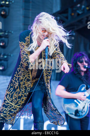 Singer Taylor Momsen of The Pretty Reckless performs on stage at the 2014 iHeartRadio Music Festival Village in Las Vegas. Stock Photo