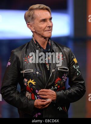 Erfurt, Germany. 5th Oct, 2014. German fashion designer Wolfgang Joop walks on stage during the ZDF show 'Wetten, dass.?' in Erfurt (Thuringia), Germany, 04 October 2014. Credit:  dpa picture alliance/Alamy Live News Stock Photo