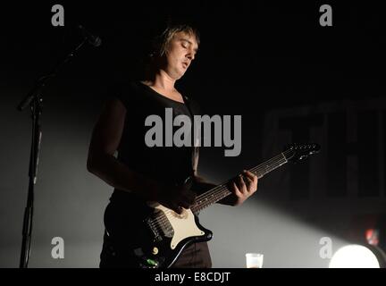 Berlin, Germany. 04th Oct, 2014. Singer Pete Doherty of the English rock band The Libertines stands on stage in the 'Arena' in Berlin, Germany, 04 October 2014. Photo: Britta Pedersen/dpa/Alamy Live News Stock Photo