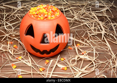 Orange plastic halloween pumpkin jack o lantern trick or treat buckets  stacked and in rows on a department store shelf ready for shoppers this  holiday Stock Photo - Alamy