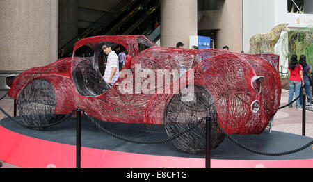 Hong Kong. 5th Oct, 2014. A creation made by South Korean artist Cho Young Chul is exhibited at Times Square, Hong Kong, south China, Oct. 5, 2014. Credit:  Li Peng/Xinhua/Alamy Live News Stock Photo