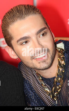 Magdeburg, Germany. 5th Oct, 2014. HANDOUT - Bill Kaulitz, singer of the band 'Tokio Hotel', smiles at a listeners' concert at the Radio SAW station in Magdeburg (Saxony-Anhalt), Germany, 05 October 2014. Credit:  dpa picture alliance/Alamy Live News Stock Photo