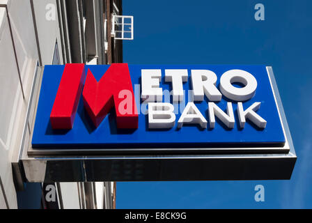 hanging sign for a branch of metro bank, kensington high street, london, england Stock Photo