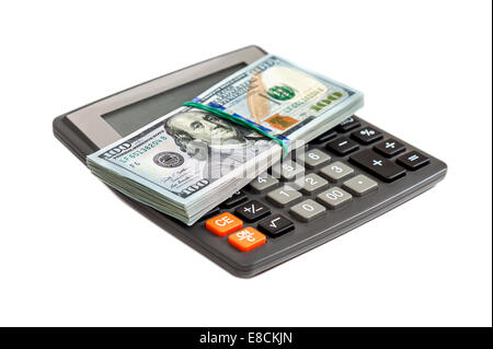 Calculator and dollars on the white background Stock Photo