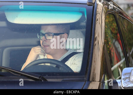 Magdeburg, Germany. 5th Oct, 2014. Gustav Schaefer, drummer of the band 'Tokio Hotel', sits in his car in Magdeburg (Saxony-Anhalt), Germany, 05 October 2014. Photo: Jens Wolf/dpa Credit:  dpa picture alliance/Alamy Live News Stock Photo