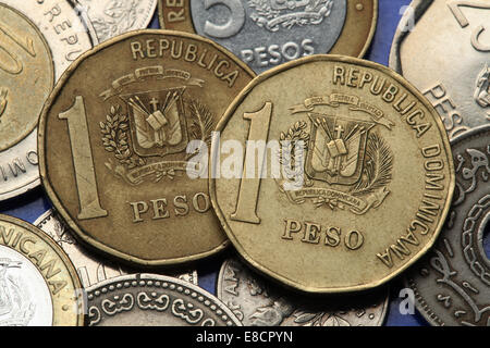 Coins of the Dominican Republic. Dominican national coat of arms depicted in the Dominican one peso coins. Stock Photo