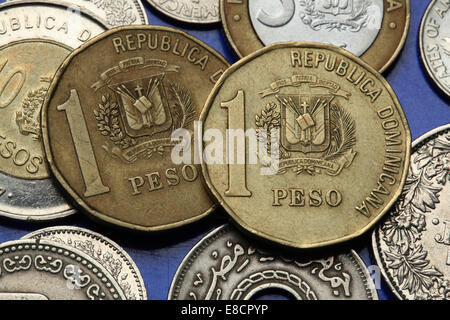 Coins of the Dominican Republic. Dominican national coat of arms depicted in the Dominican one peso coins. Stock Photo