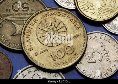 Coins of Greece. The Vergina Sun also known as the Macedonian Star depicted in the old Greek 100 drachma coin. Stock Photo