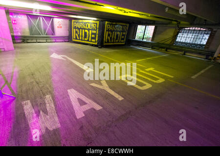 Parkour Ride a multi-discipline cycling event held in an abandoned multi-storey car park, Tobacco Dock, London, UK. 4th Oct, 2014 Credit:  Simon Balson/Alamy Live News Stock Photo