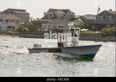 Commercial Fishing boats underway in Galilee Point Judith Narragansett Rhode Island USA Stock Photo