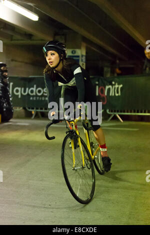 Jess Morgan (106) at Parkour Ride a multi-discipline cycling event held in an abandoned multi-storey car park, Tobacco Dock, London, UK. 4th Oct, 2014 Credit:  Simon Balson/Alamy Live News Stock Photo