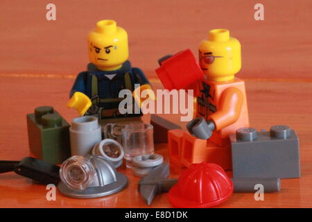 Lego Construction Workers Taking Break Stock Photo