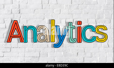 Analytics and Brick Wall in the Background Stock Photo