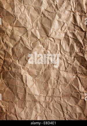 Old crumpled piece of paper is not smooth. Stock Photo